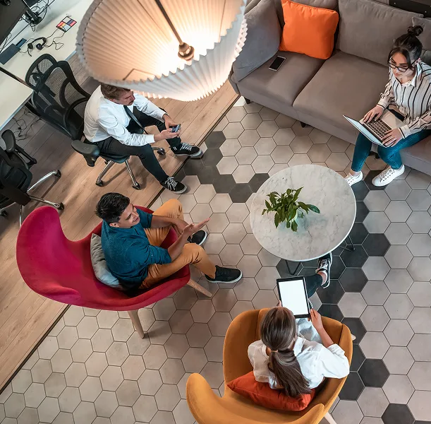 Modern office workspace with collaborative team members